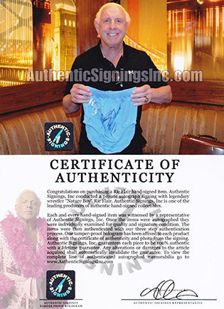 "Nature Boy Ric Flair 16X Wooooo" Autographed Baby Blue Wrestling Trunks